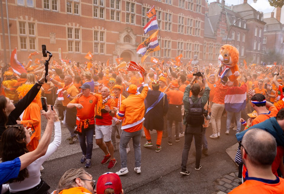 Thousands of Dutch fans have been partying along the amusement mile ahead of their first game against Poland