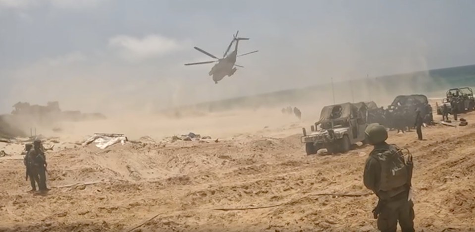 An army helicopter then takes off from a makeshift helipad and heads for Israel