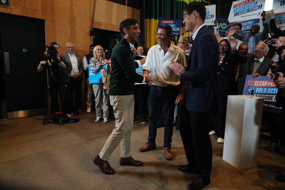 Prime Minister Rishi Sunak with Milton Keynes candidates Ben Everitt (centre) and Johnny Luk (right), after delivering a stump speech to party members at the MK Gallery