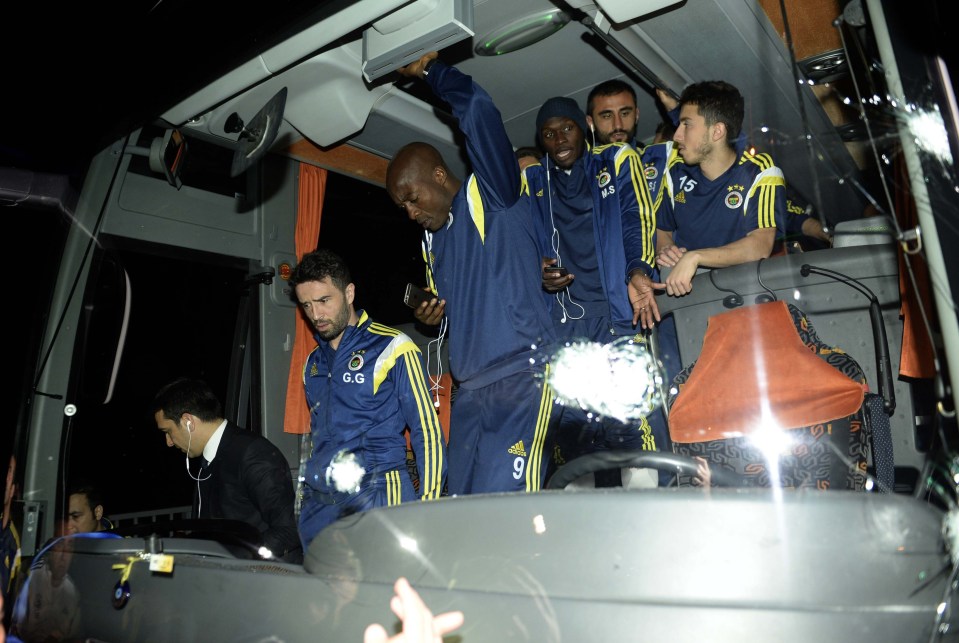 a group of soccer players on a bus with one wearing the number 9