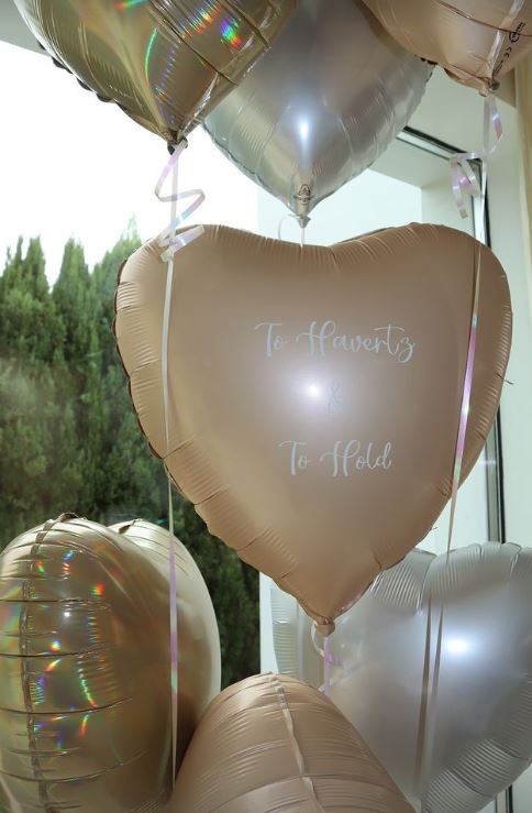 The balloons read 'To Havertz & To Hold'