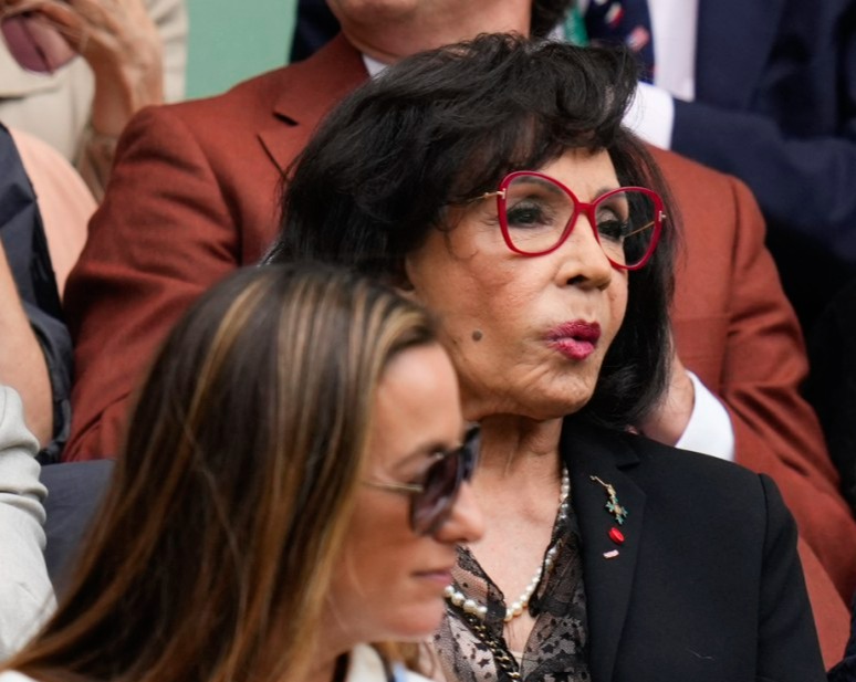 Shirley Bassey watches the semifinal match between Carlos Alcaraz of Spain and Daniil Medvedev of Russia at the Wimbledon tennis championships in London, Friday, July 12, 2024. (AP Photo/Kirsty Wigglesworth)