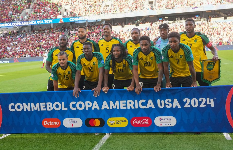 a group of soccer players standing in front of a banner that says conmebol copa america usa 2024
