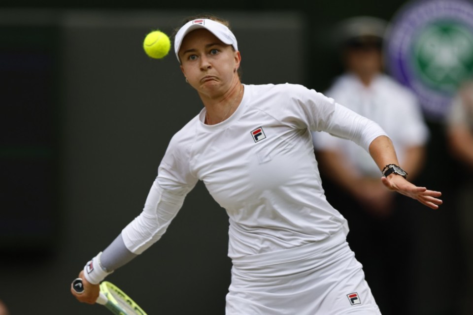 epa11475785 Barbora Krejcikova of the Czech Republic in action during her Women's Singles final match against Jasmine Paolini of Italy at the Wimbledon Championships in London, Britain, 13 July 2024. EPA/TOLGA AKMEN EDITORIAL USE ONLY