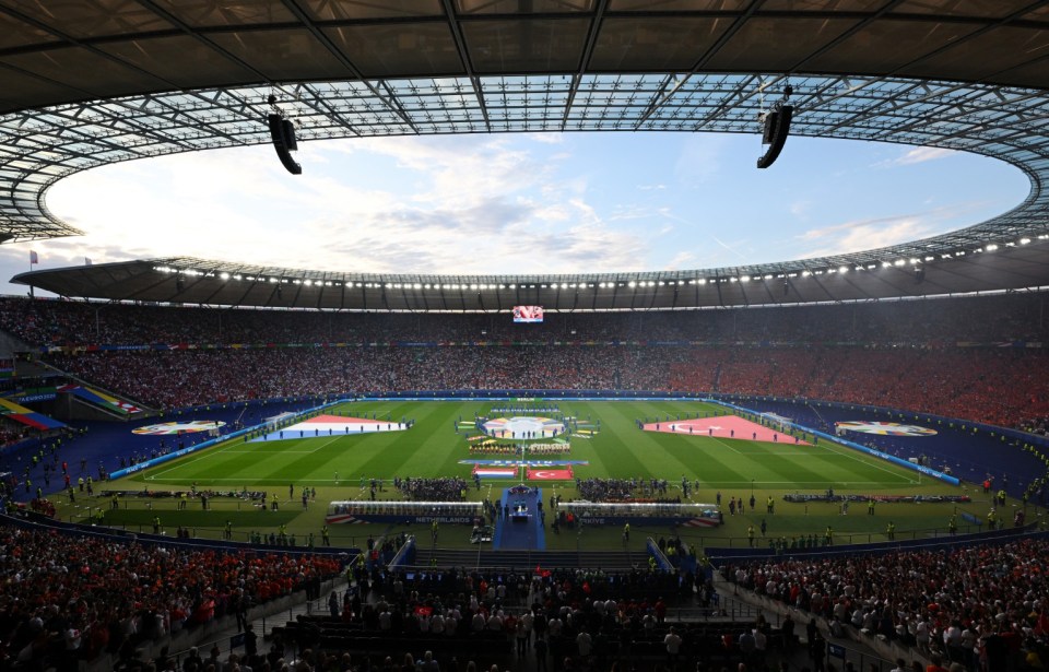 BERLIN, GERMANY - JULY 06: A general view of the inside of the stadium as players of the Netherlands and Turkiye line up during the National Anthems prior to the UEFA EURO 2024 quarter-final match between Netherlands and Türkiye at Olympiastadion on July 06, 2024 in Berlin, Germany. (Photo by Tullio Puglia - UEFA/UEFA via Getty Images)
