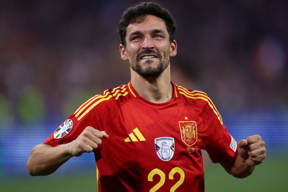 a man wearing a red jersey with the number 22 on it