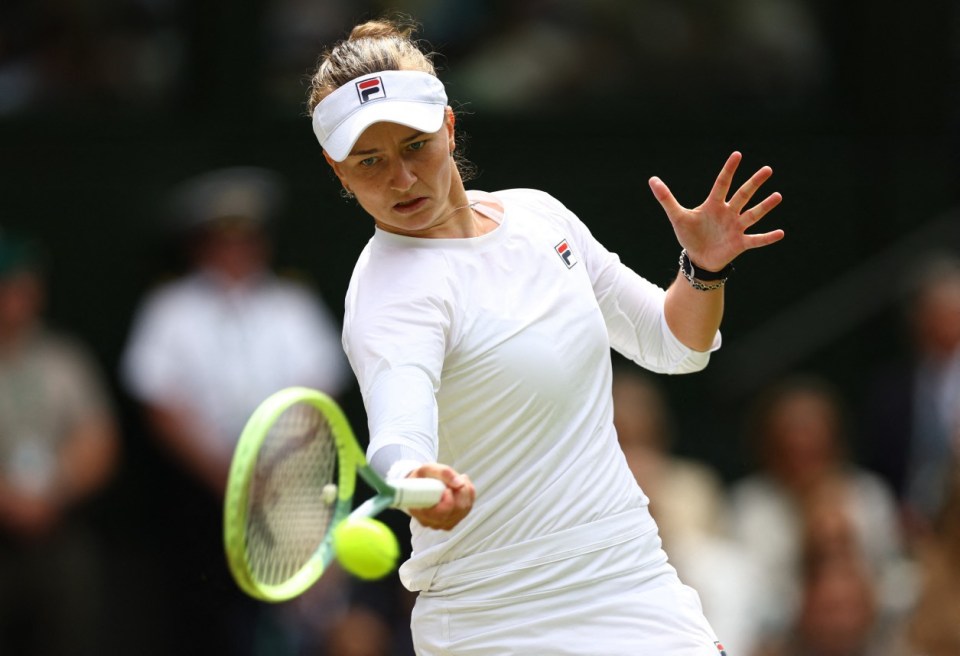 Tennis - Wimbledon - All England Lawn Tennis and Croquet Club, London, Britain - July 13, 2024 Czech Republic's Barbora Krejcikova in action during the final against Italy's Jasmine Paolini REUTERS/Hannah Mckay