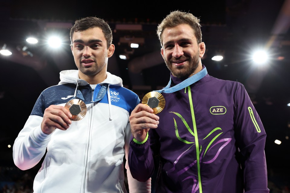Osmanov recovered and was able to collect his medal