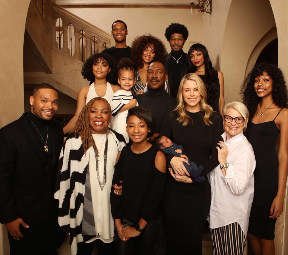 Eddie with all ten of his kids, including Mel B’s daughter Angel, at the front next to his mother Lillian. His fiancee Paige and her mum are also picture