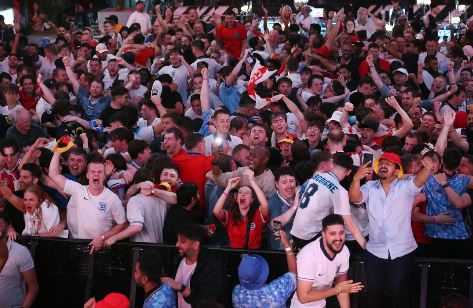 Fans celebrate at the Boxpark Fan Zone after England beated the Netherlands