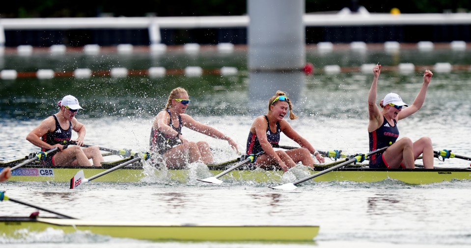 four women in a boat that says csr on the side