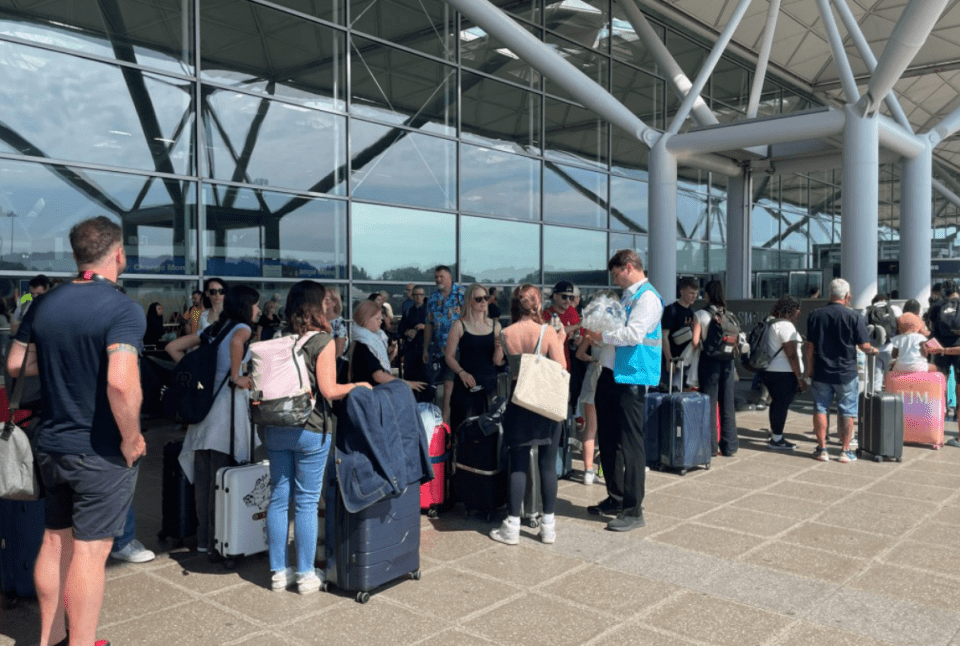 Passengers were being handed bottled water at the London Airport amid delays