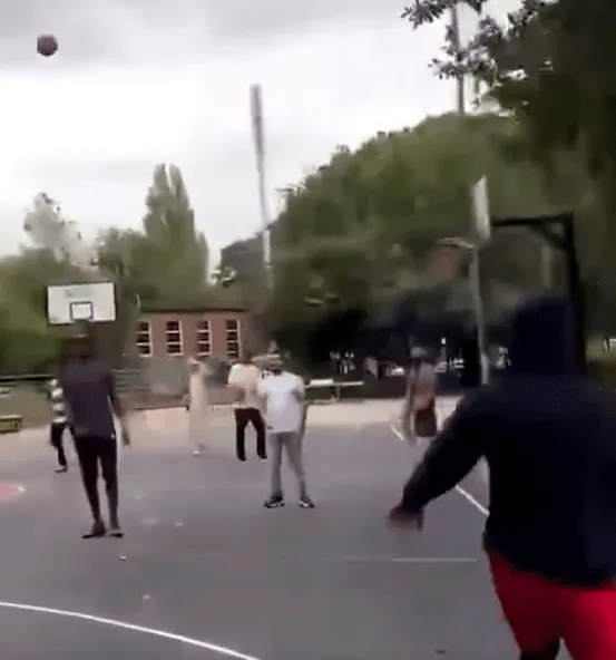 The basketball floated towards the hoop