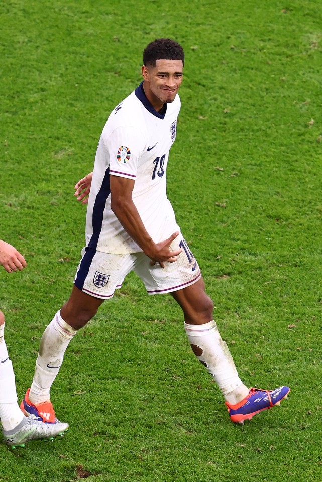 a soccer player with the number 18 on his jersey