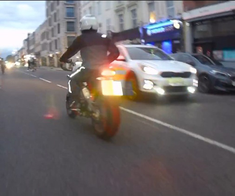 The motorcyclist was seen tearing down the road