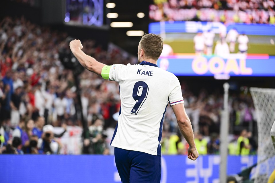 Harry Kane celebrates with England fans after Ollie Watkins' winner