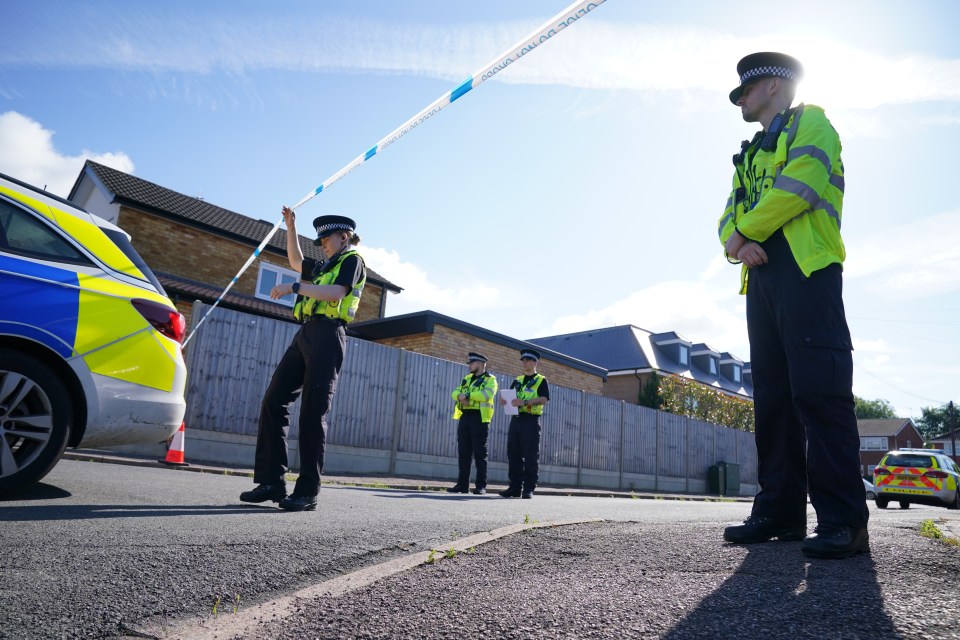 Police officers remain at the scene this morning