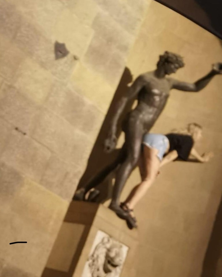 The unnamed tourist was seen mimicking sexual acts on the monument