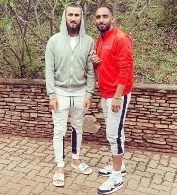 two men are standing next to each other on a page that says " please share and repost "