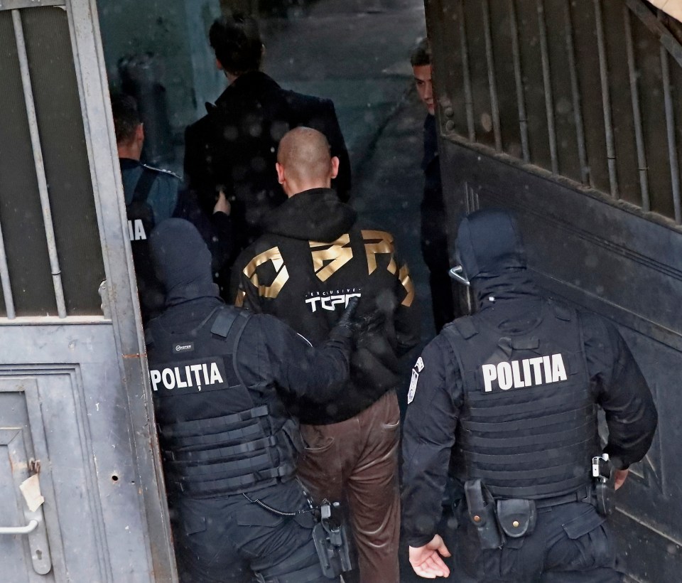 a group of police officers with the word politia on their uniforms