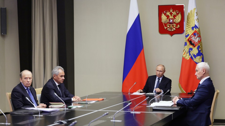 Russian President Vladimir Putin, second right, chairs a meeting with Defense Minister Andrei Belousov, right, Federal Security Service Chief Alexander Bortnikov, left, and Security Council Secretary Sergei Shoigu, second left, on the situation in Kursk region, where Ukrainian armed forces attempted an offensive to seize territory at the Novo-Ogaryovo state residence, outside Moscow, Russia on Wednesday, Aug. 7, 2024. (Aleksey Babushkin, Sputnik, Kremlin Pool Photo via AP)