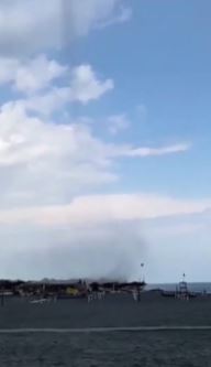 a plane is taking off from an airport runway .
