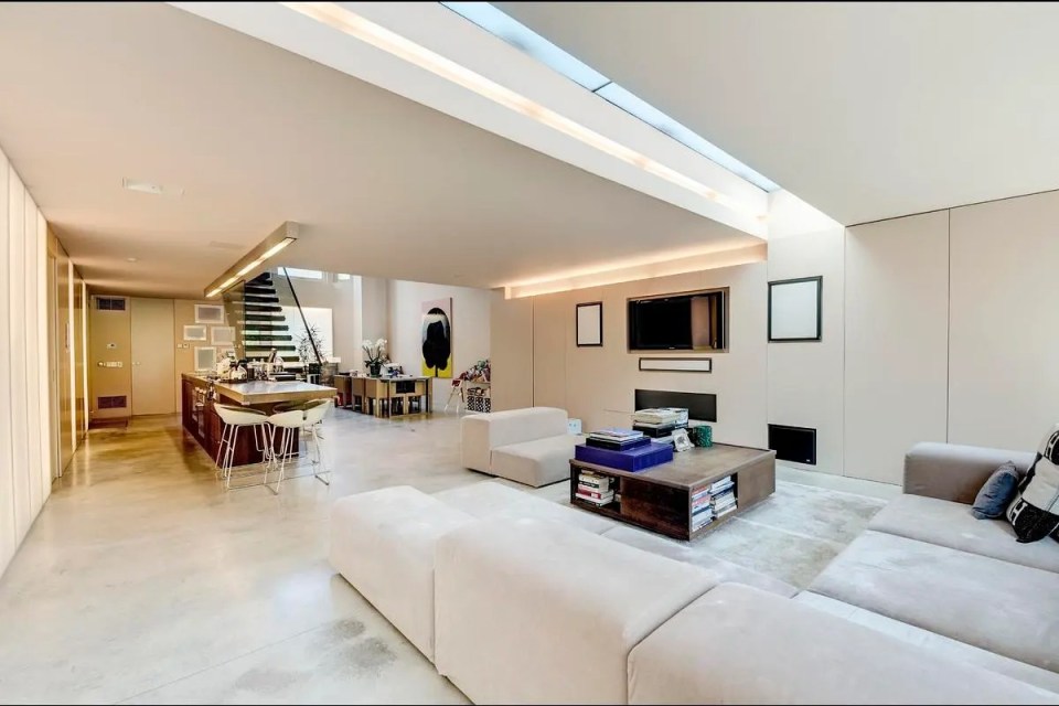 a living room with a couch and a coffee table