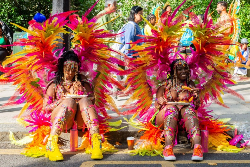 Alamy Live News. 2XXRY8R Notting Hill, London, UK. 26th Aug, 2024. Europe?s largest street festival is to take place later in the streets of Notting Hill. Jamaican themed exotic dancers and musical groups will parade through the streets, with food and street entertainment around the area adding to the event. The Grand Parade takes place on Bank Holiday Monday as the culmination of the three-day festival which began in 1966. Participants are gathering nearby and preparing their colourful costumes, with security policing and graffiti-covered protective hoardings in place. Credit: Avpics/Alamy Live News This is an Alamy Live News image and may not be part of your current Alamy deal . If you are unsure, please contact our sales team to check.