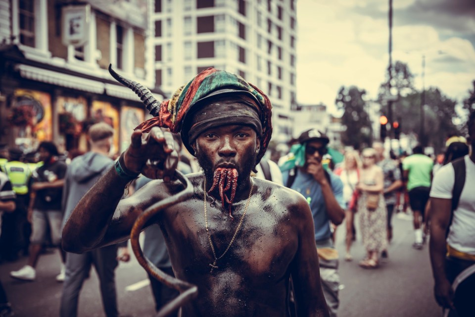London's biggest street party. The streets of west London are filled with Caribbean colours, music and flavours during Notting Hill Carnival. Elaborate floats and costumed performers wind their way through the streets in the carnival parade, people dance to the sound of steel bands and calypso music, and visit the tempting food stalls along the route. Pictured: notting hill carnival 2024,london,notting hill,carnival 2024 Ref: BLU_S7876370 250824 NON-EXCLUSIVE Picture by: mightyquinnphotos.com / SplashNews.com Splash News and Pictures USA: 310-525-5808 UK: 020 8126 1009 eamteam@shutterstock.com World Rights