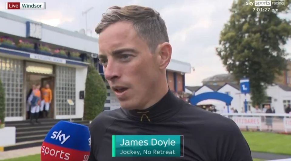 jockey james doyle is being interviewed by sky sports