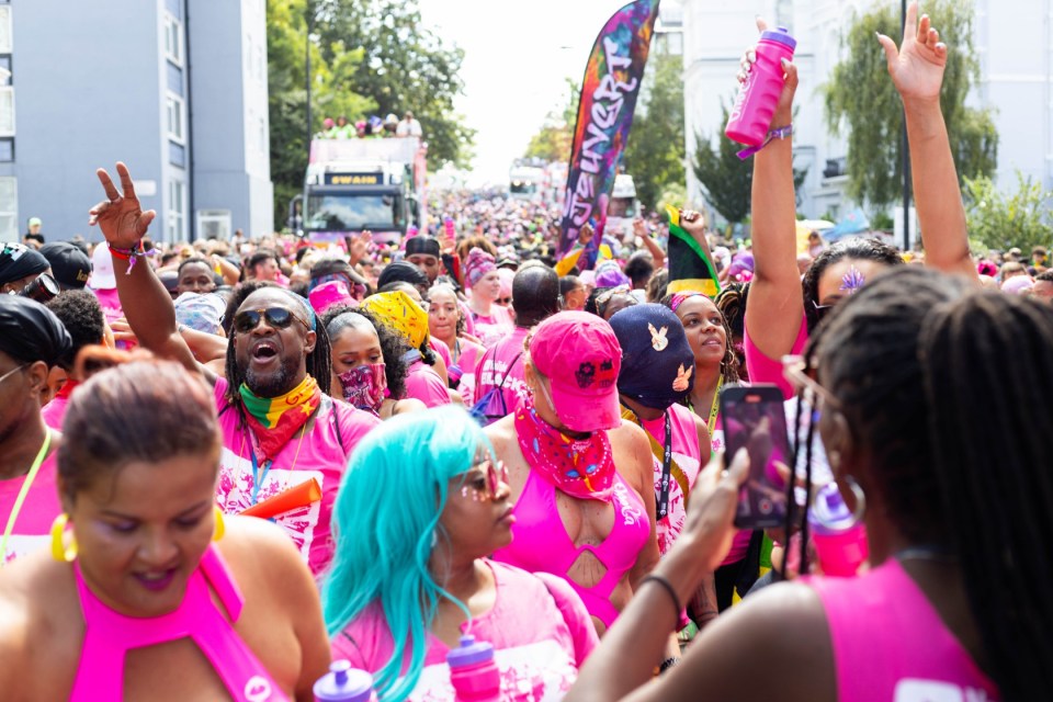 Mandatory Credit: Photo by Sinai Noor/REX/Shutterstock (14660216bc) Parades and celebrations are in full swing at Notting Hill Carnival, with over a million people expected to join the festivities. Notting Hill Carnival 2024 - 25 Aug 2024
