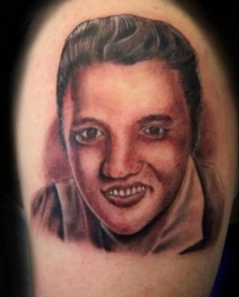 a tattoo of elvis presley on a person 's arm