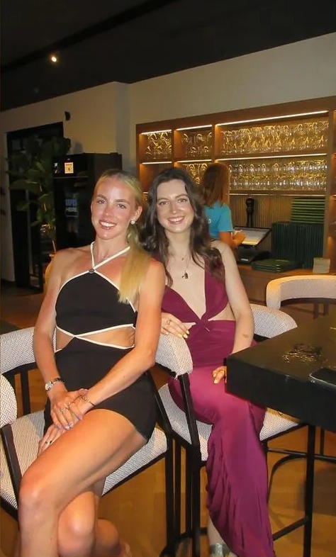 two women are posing for a picture with the caption daisie darnell
