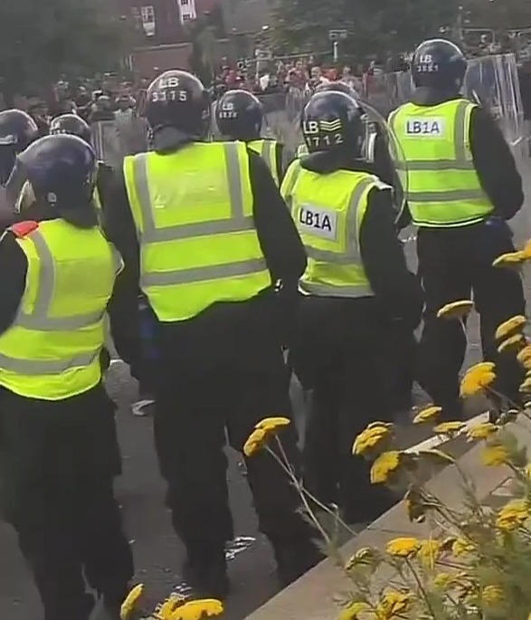 a group of police officers wearing lb1a vests