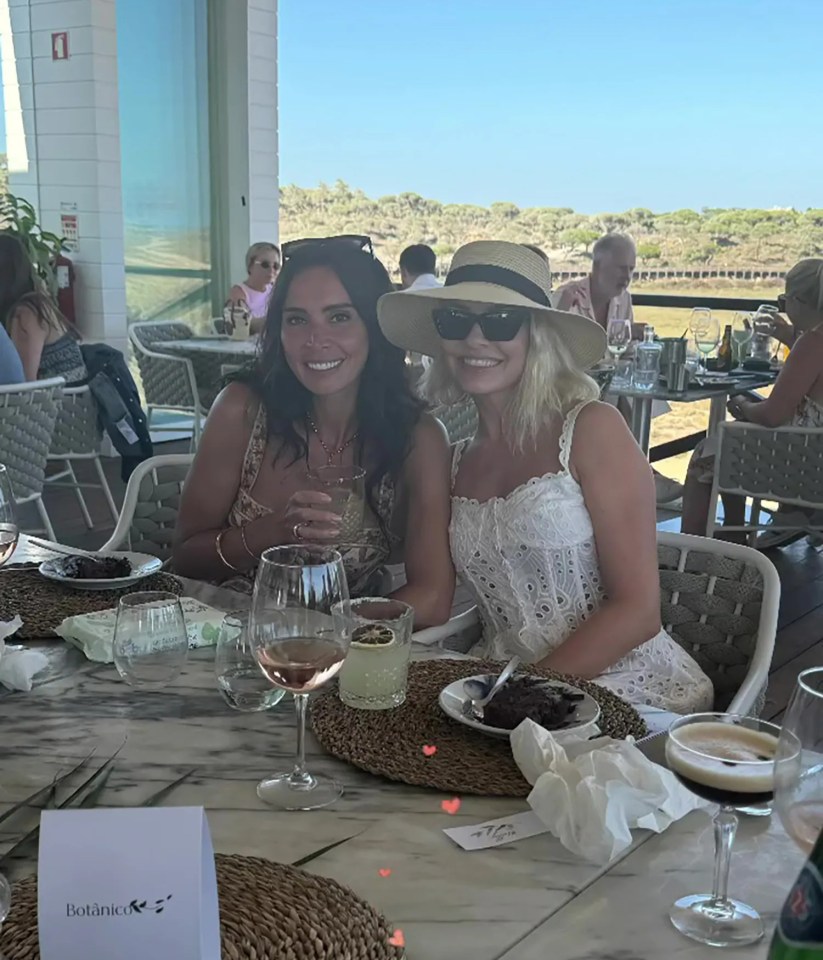holly willoughby and christine lampard are sitting at a table
