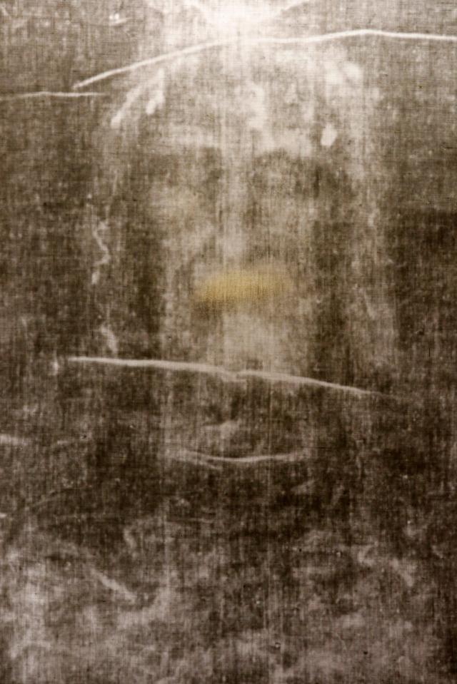 a black and white photo of a person 's face