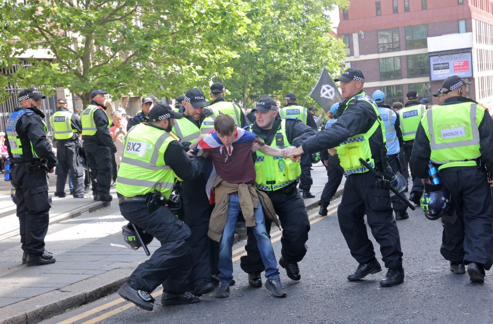 a group of police officers with bk2 on their vests