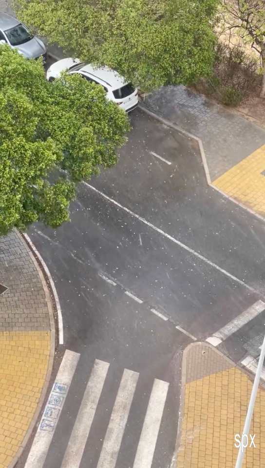 Large balls of hail fell down onto the streets and tourists