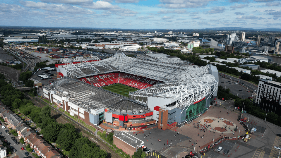 an aerial view of the manchester united stadium