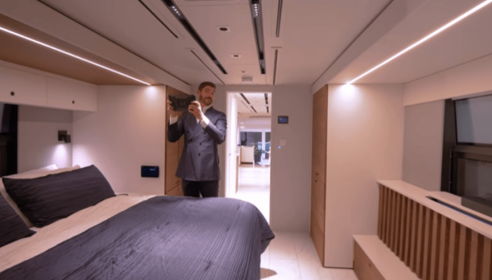 A master bedroom with ensuite is located at the back of the motorhome