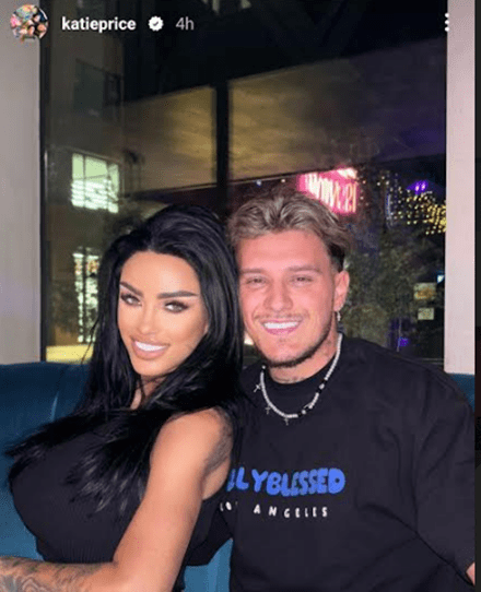 a man and a woman are posing for a picture and the man is wearing a shirt that says ully blessed