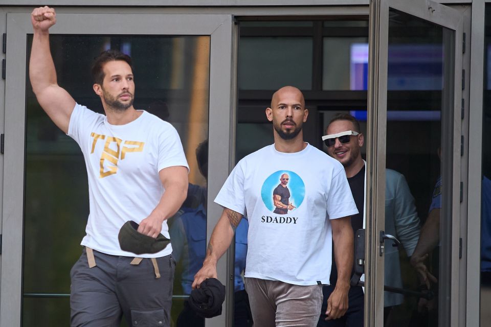 a man wearing a t-shirt that says ' daddy ' on it