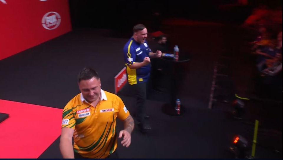 a man in a yellow shirt with the word colgate on it