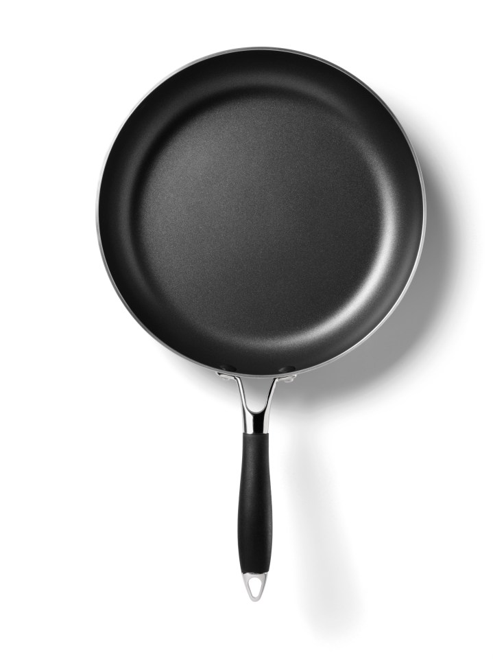 a frying pan with a black handle on a white background