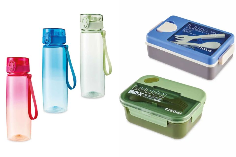 a lunch box with a fork and spoon inside of it