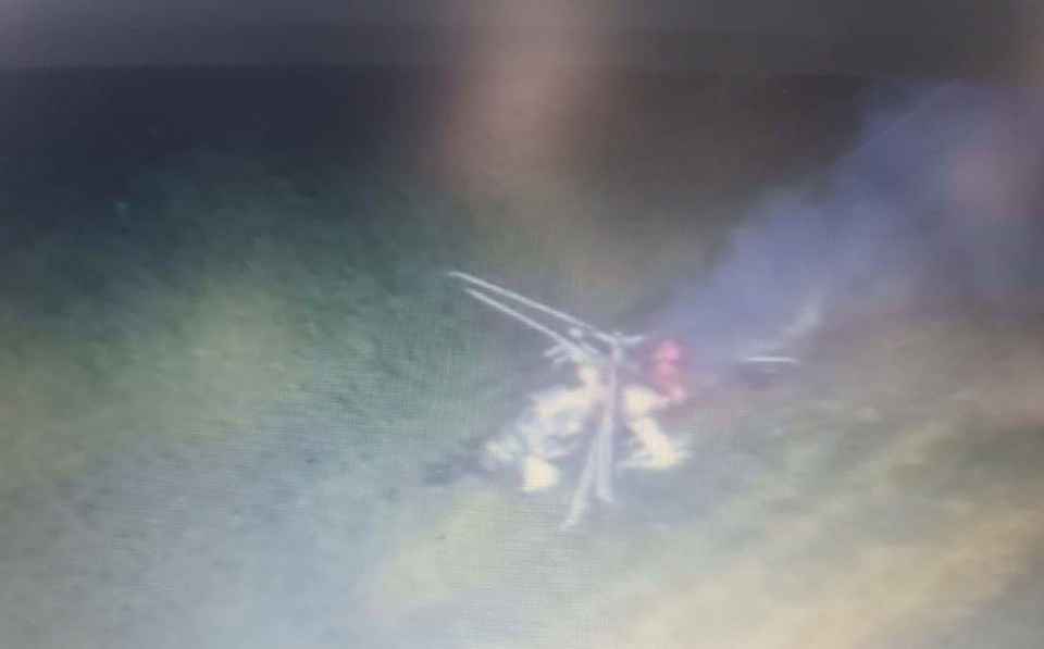 a blurry picture of a person laying on the ground