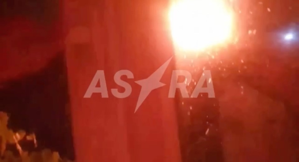 the word astra that is on a red background