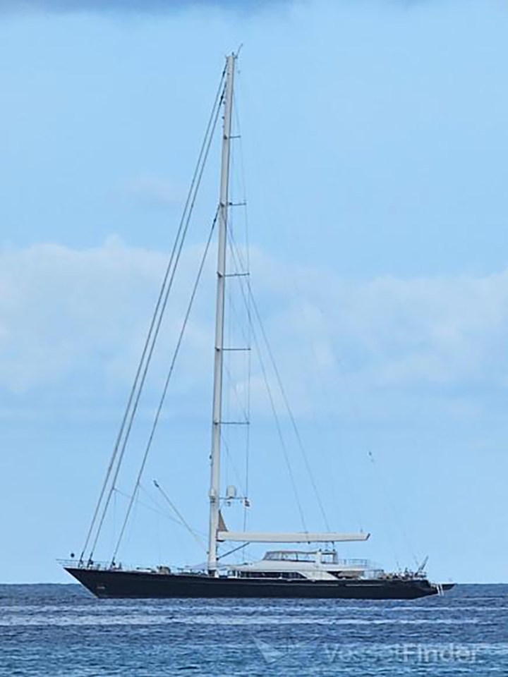a large sailboat is floating on top of a large body of water