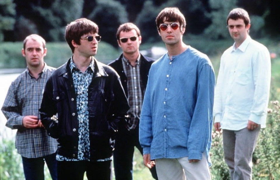 a group of men standing next to each other with the letters rgb on the bottom