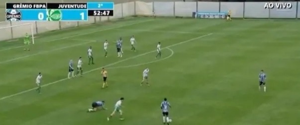 a soccer game between gremio and juventude is underway